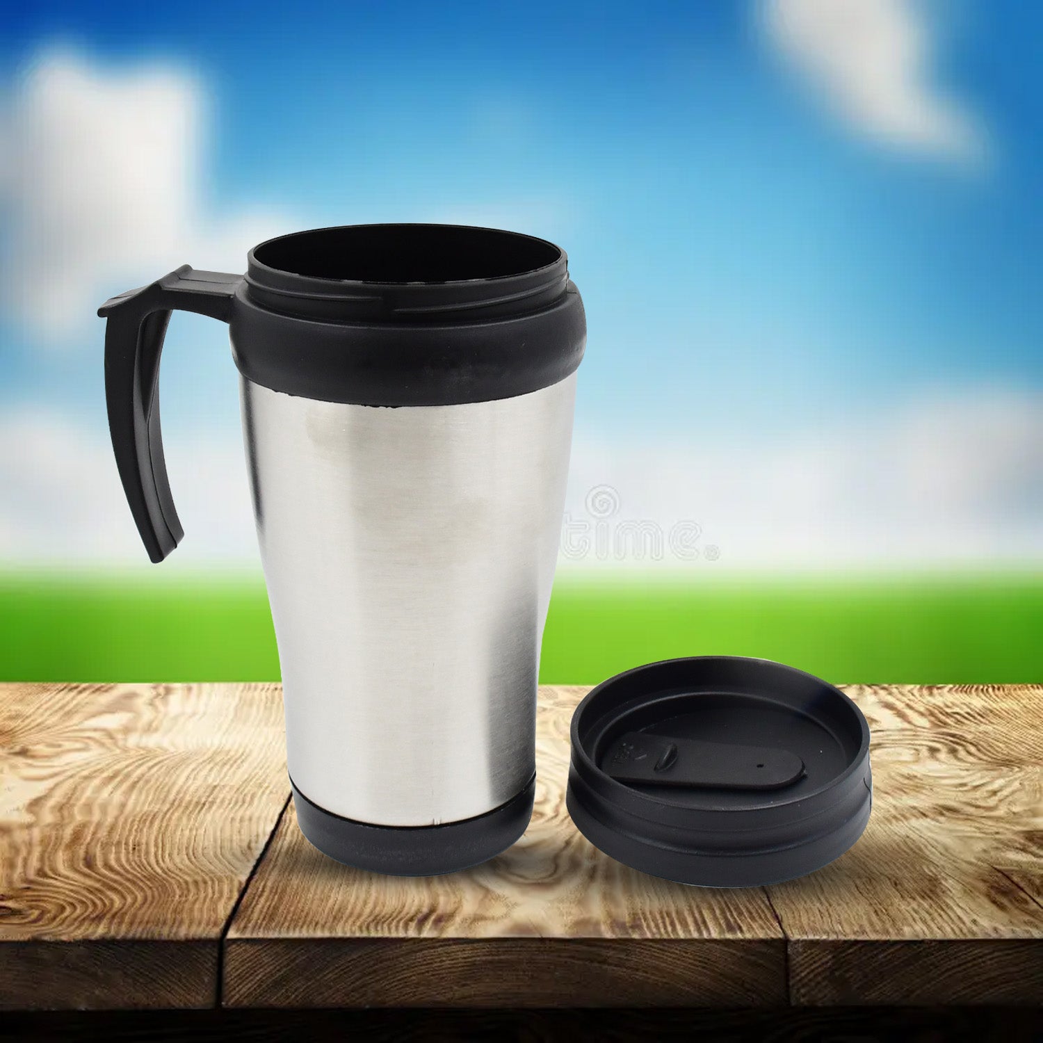 Stainless steel mug fitting perfectly into a car cup holder.
