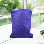 Reusable grocery bag in a neutral colour, folded for compact storage.