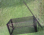 Multiple foldable animal traps stacked, showing reusable design.