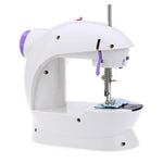 XcelCraft mini sewing machine performing a straight-line stitch on fabric.