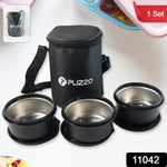 Stainless steel lunch box containers placed neatly inside insulated carry bag