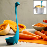 Silicone soup spoon with long handle, ideal for stirring and serving hot dishes.