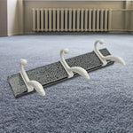 Minimalist GlimmerHome wall mounted coat rack holding a dog leash and jackets
