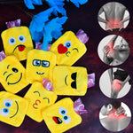Mini hot water bag with a cheerful emoji design, offering fun pain relief.