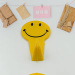 Self adhesive hooks demonstrating strong adhesion on multiple smooth surfaces.