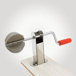 Close-up view of the Quickslice stainless steel coconut scraper's grating surface.