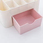 Close-up of the drawer in the multi-purpose cosmetic storage box, ready for small items.