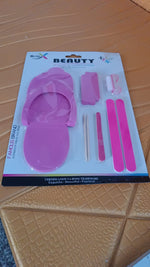 Reusable foot care tools organized for personal pedicure kit