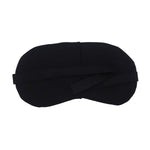 Side view of a sleep mask for travel, showing the adjustable elastic strap for a secure fit.