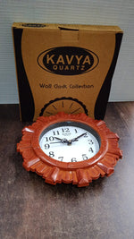 Aesthetic wooden look round wall clock elegantly displayed in a contemporary room setting.
