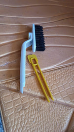 Close-up view of rotating floor scrub brush designed for tough dirt removal