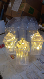 Crystal table lamp creating a cozy ambiance with its LED flickering candle light, ideal for bedrooms.