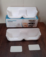 Clear design of the Sunglass Wall Organizer holding glasses, blending seamlessly with decor.