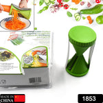 Handheld vegetable spiralizer creating long, thin strands of zucchini for a healthy meal
