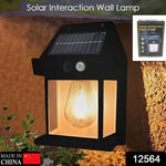 Solar Wall Lamp illuminating a porch at dusk, showing its bright light.