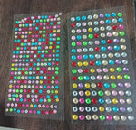 Brightly shimmering self-adhesive decorative shining stone stickers on display.