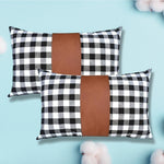 Versatile leather and cotton pillow cover, perfect for various home settings.