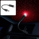USB Star Projector creating a vibrant galaxy effect in a car.