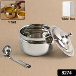 Side view of the mirror-finish Stainless Steel Ghee Pot with serving spoon.