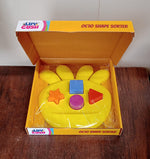 Packaging and components of the Octo Shape Sorter Toy, showcasing its contents.