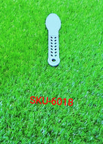 The plastic foot scrubber positioned to show its ergonomic curve and efficient callus remover surface.