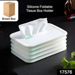 Compact silicone tissue holder in a bathroom setting.