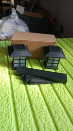 Packaging for the two-pack solar garden lights, emphasizing easy transport and setup.