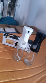 Durable glass oil bottle for cooking, baking, and salad preparation.