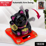 Close-up of the smiling Waving Lucky Cat with its arm waving automatically.