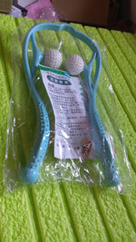Portable massager wrapped comfortably around a user's neck, showcasing its secure fit.