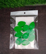 Green plant vines gracefully held in place by climbing wall clips.