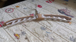 Multiple folding hangers stacked for efficient storage.