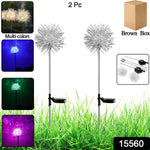 Solar color changing dandelion garden lights glowing in multicolor in outdoor garden