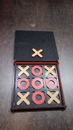 Lifestyle image of the X & Zero wooden board game, ready for play on a table, suggesting family fun.