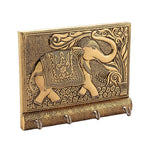 Detailed shot showcasing the antique gold elephant motif on the decorative key holder.