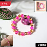 Glossy transparent stretch bracelet showcasing elastic band fit