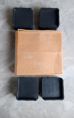 Adjustable base stands providing stable support for a washing machine.