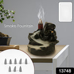 Close-up of Ganesha Smoke Fountain Idol, intricately designed poly resin.