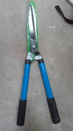 Adjustable hedge shear with sturdy handles for versatile trimming.