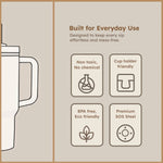 Angled view of insulated travel mug with spill-proof lid and handle