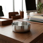 Tabletop cigarette ashtray placed on table, ideal for indoor use