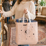 Close-up of reusable tote bag showing print and material