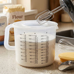 Measuring storage container with ergonomic handle
