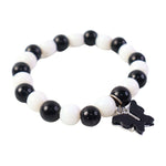 Stylish black and white bracelet displayed on clean white background