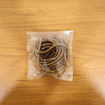 Brown spiral cable protector sleeve shown protecting charging cable live