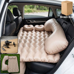 Inflated car air mattress in rear seat for travel comfort