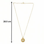 angled view of golden necklace chain and intricate pendant