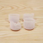 Silicone chair leg covers designed to protect floors and reduce noise