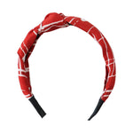 Twisted knot headband in red and white print