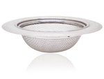 Stainless steel sink strainer seamlessly installed in a modern kitchen basin.